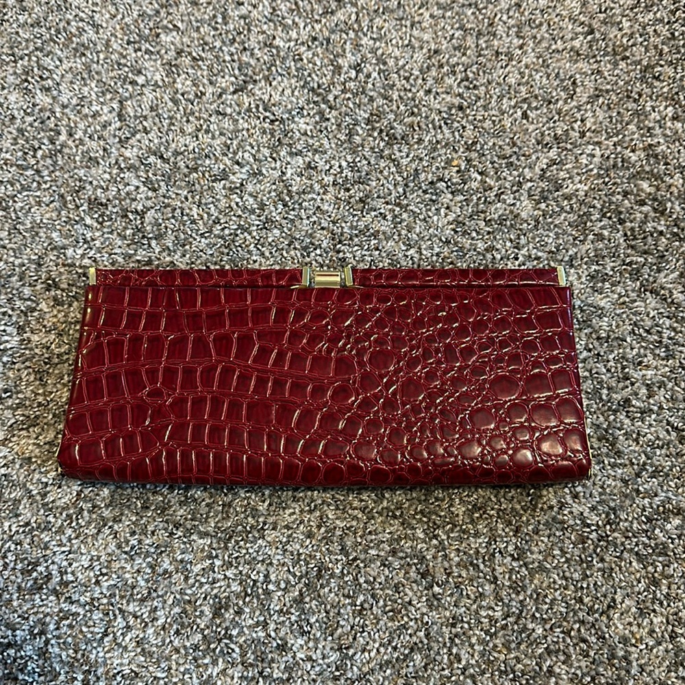 Joan Rivers, Red Faux Alligator skin clutch bag